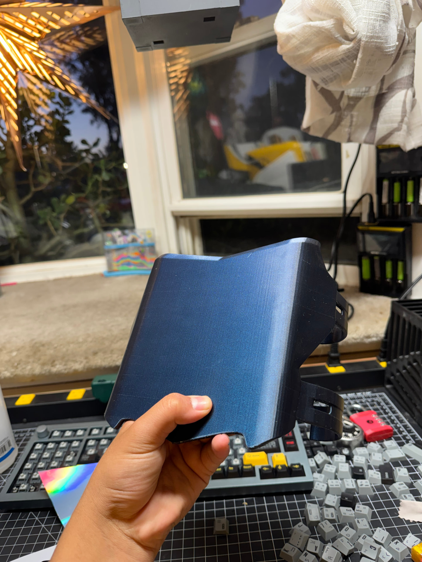 Space sparkle blue front plate held in hand